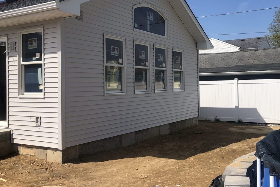 Newly installed Andersen windows and new siding on a Long Island house. Just Enterprise One Corp.