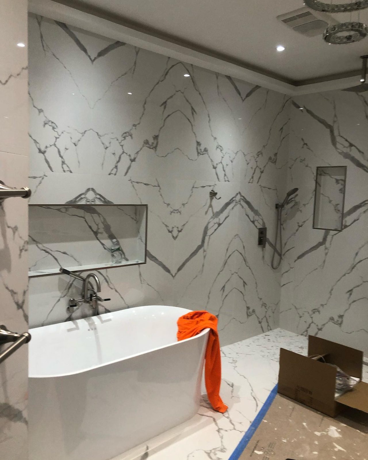 Full view of luxury marble bathroom suite