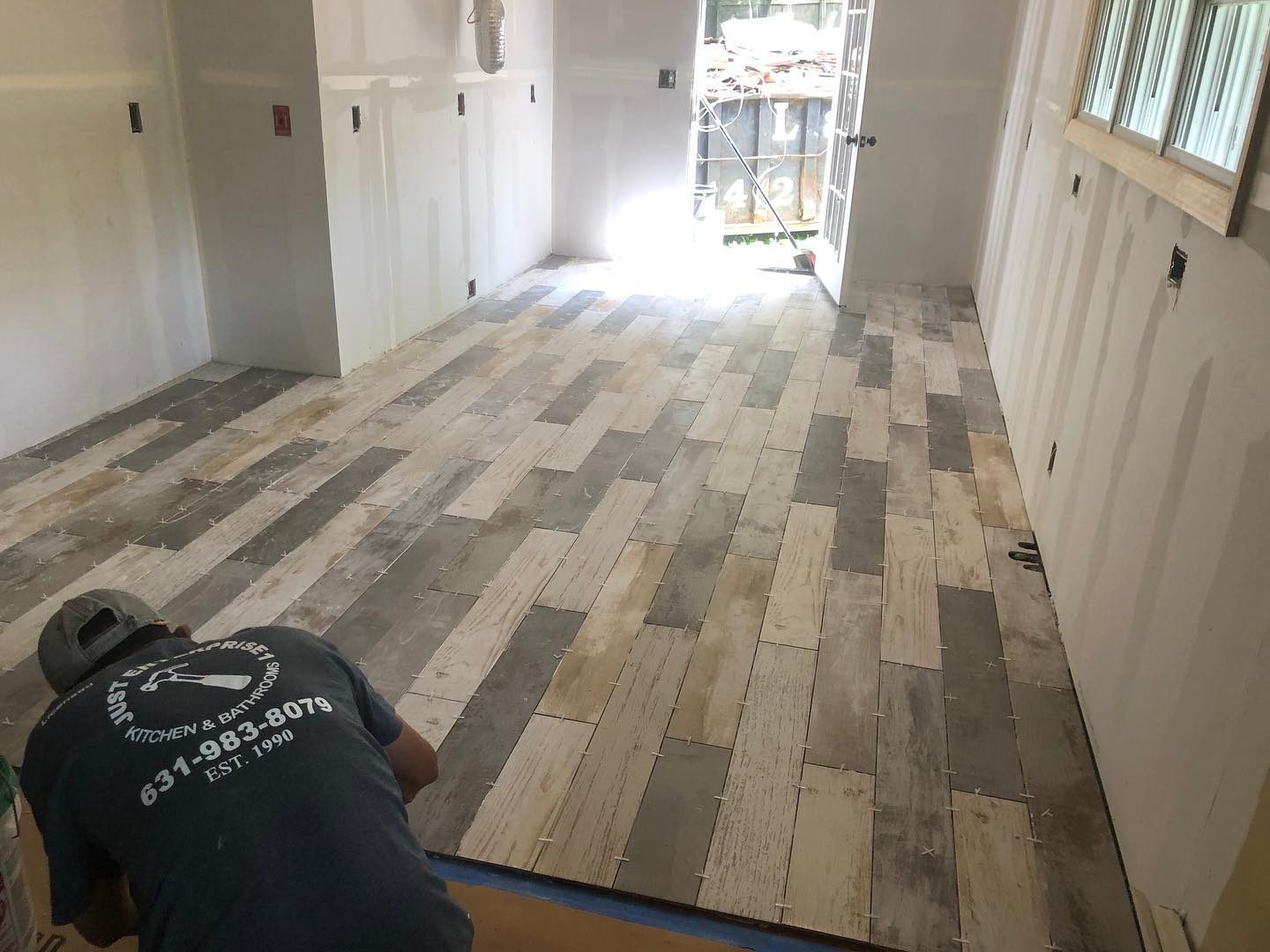 Wood-look porcelain tile floor installation