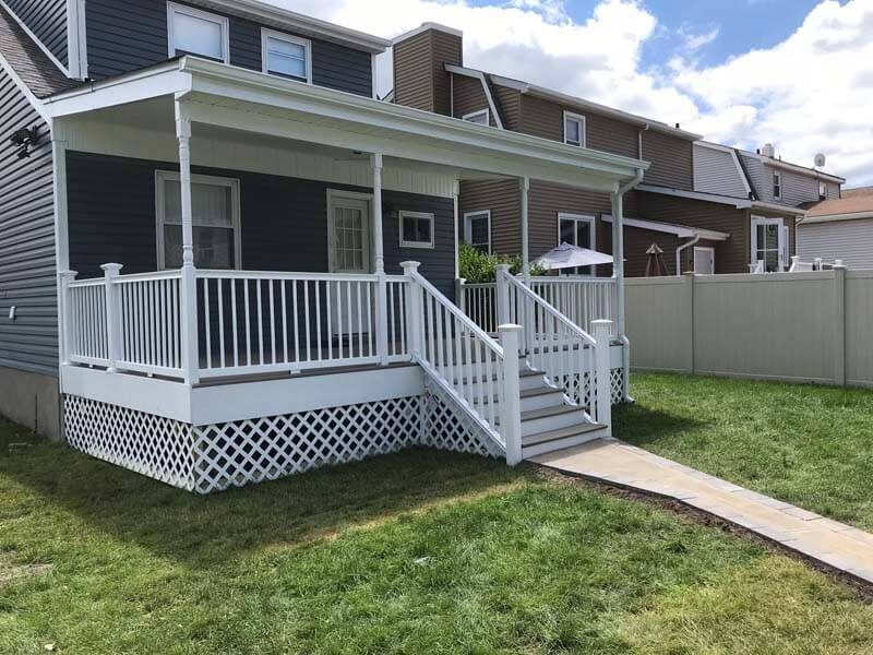 Blue vinyl siding installation on Long Island home