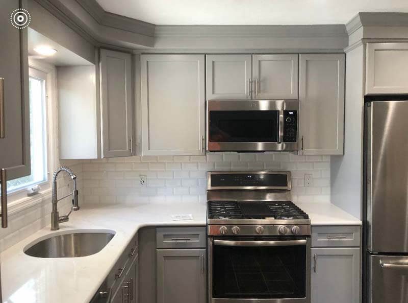 Gray kitchen with white quartz countertops — Huntington, NY